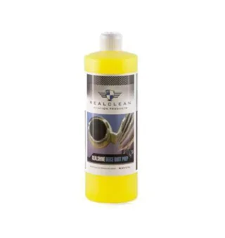 Yellow bottle of car polish with black and silver label on white background