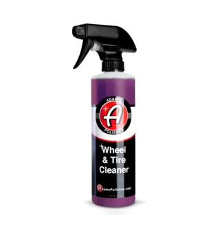 Bottle of wheel and tire cleaner with black spray nozzle, on white background