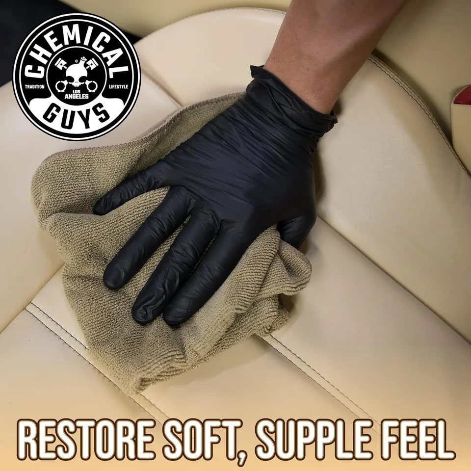 Gloved hand wiping beige leather car seat; Chemical Guys logo and text overlay.