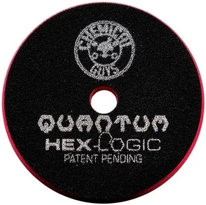 Black circular logo reading “Quantum Hex Logic” with a small academic games seal.