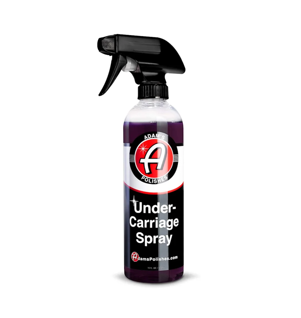 Black aerosol trigger bottle labeled Under-Carriage Spray on white background