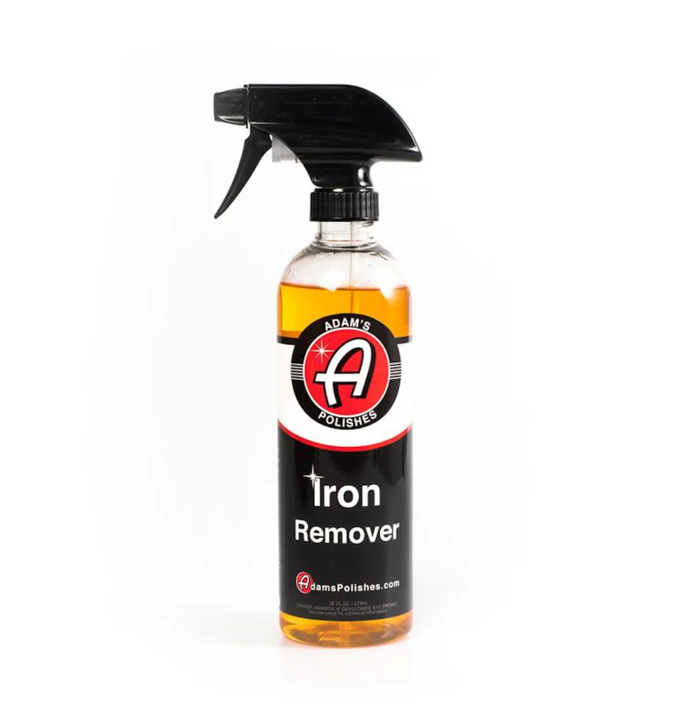 Spray bottle of Iron Remover car cleaner with black trigger nozzle