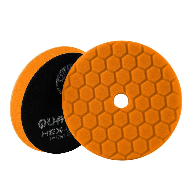 Orange hex-pattern foam polishing pads, one stacked behind the other