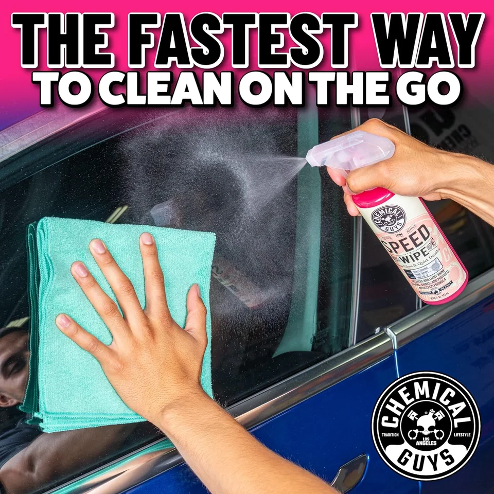 Hand spraying cleaner on a car window while wiping with a turquoise cloth