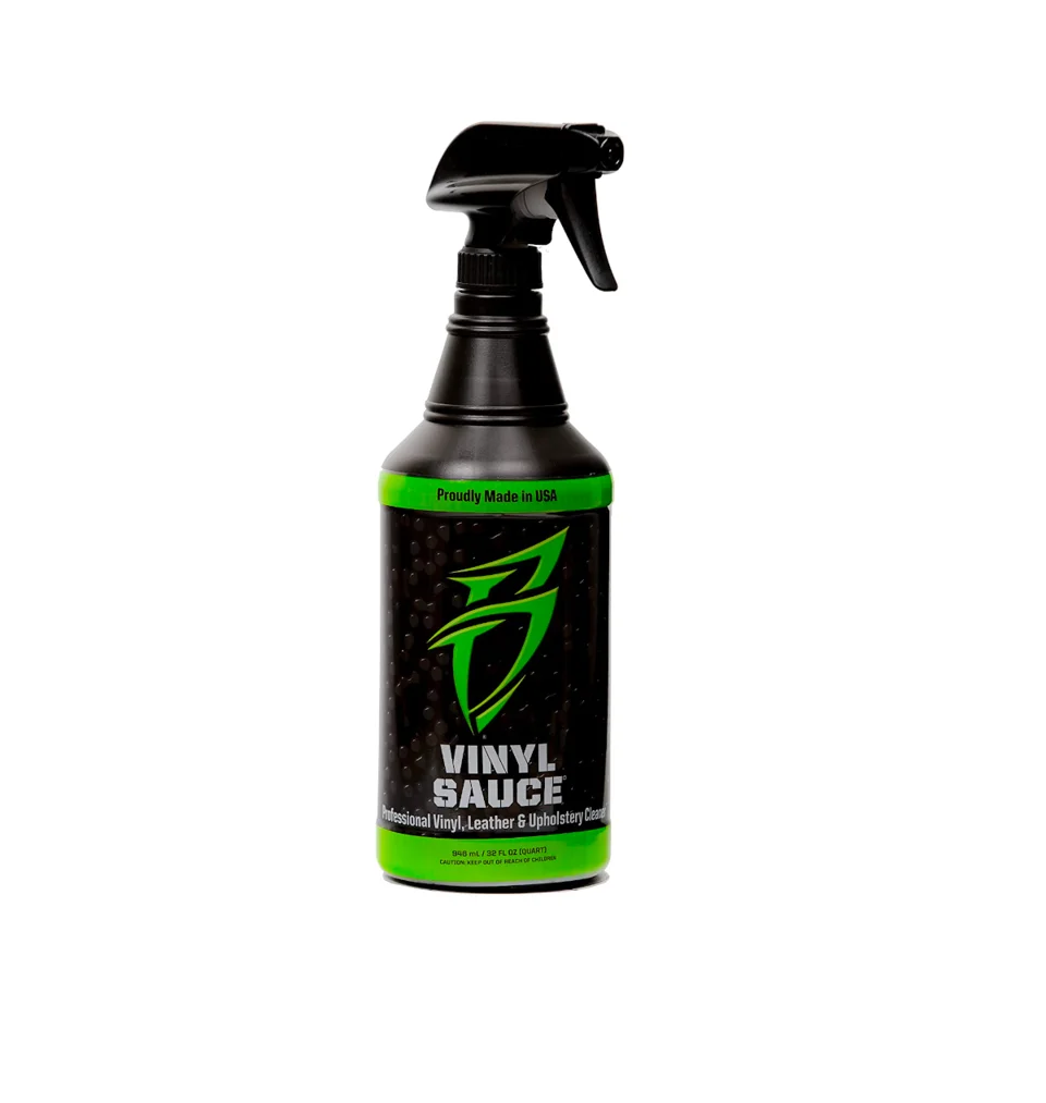 Black spray bottle of Vinyl Sauce cleaner with green label on white background