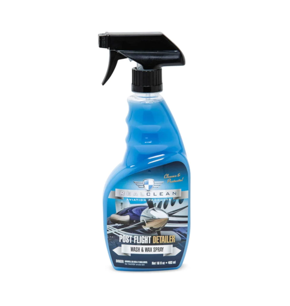 Blue spray bottle of auto glass cleaner with a black trigger nozzle