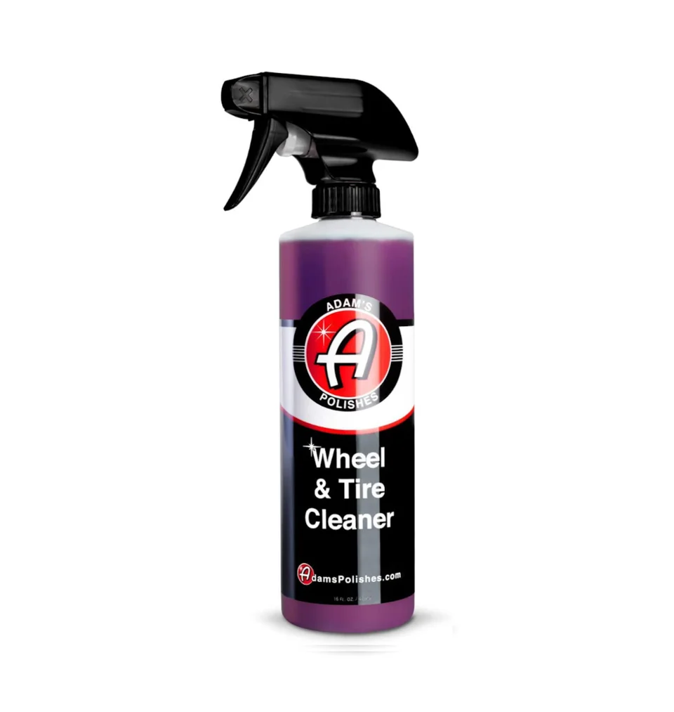 Bottle of wheel and tire cleaner with black spray nozzle, on white background